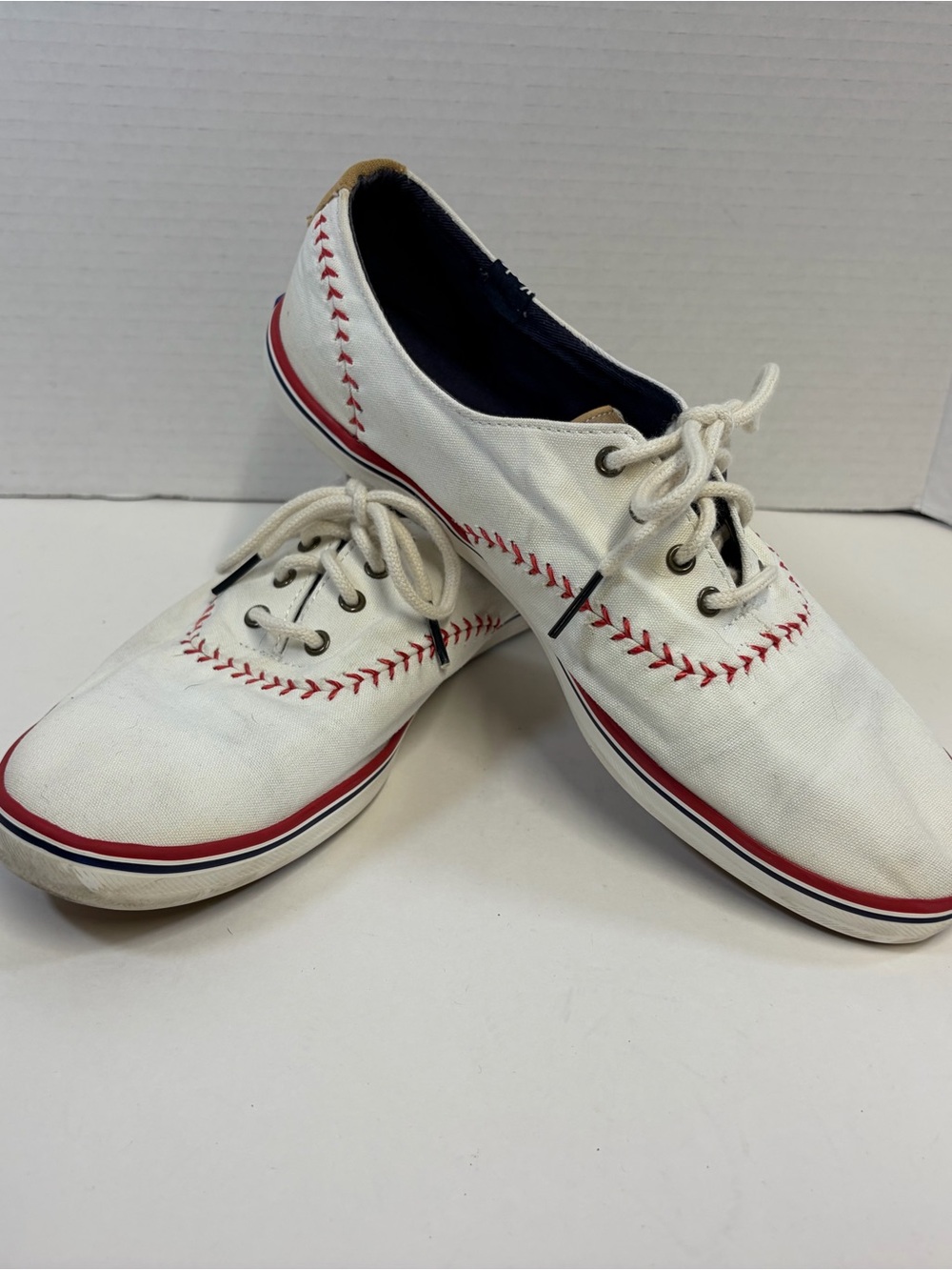 Keds White Canvas Sneakers with Red Stitching and Trim